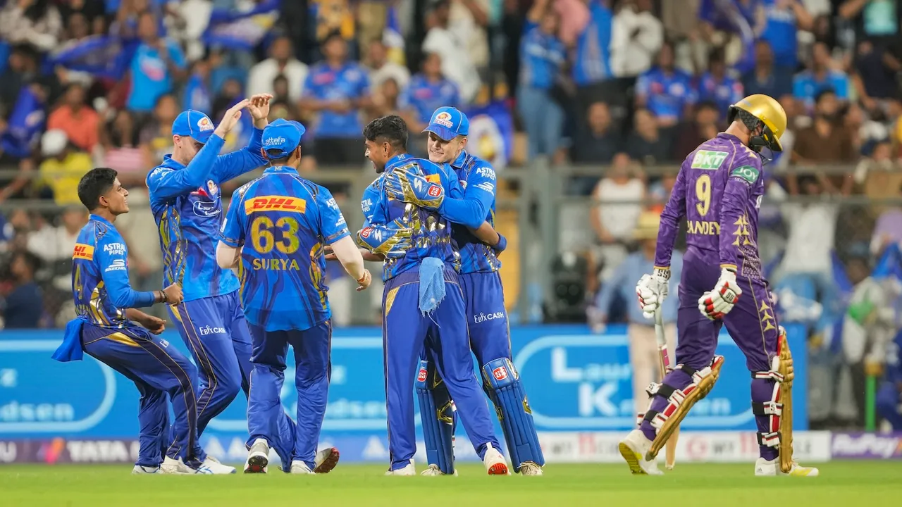 MI bowler Ashwani Kumar celebrates with teammates the wicket of KKR batter Manish Pandey in Mumbai on Monday, March 31, 2025.