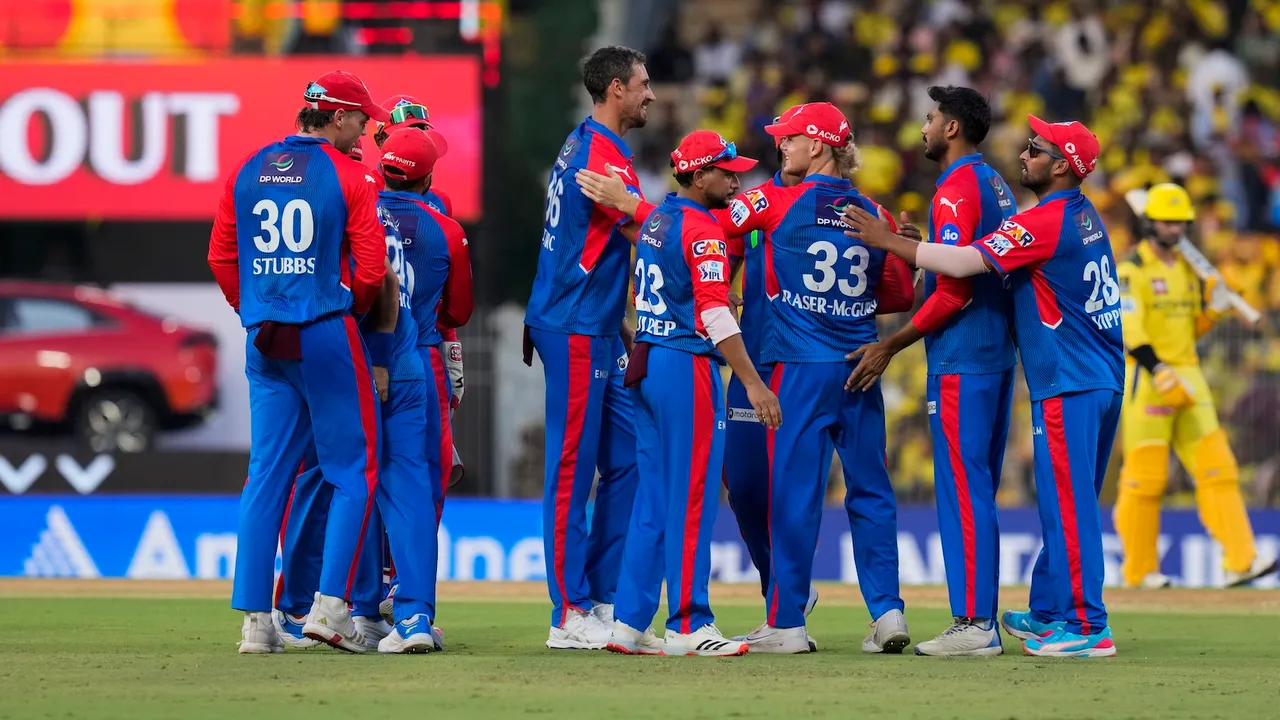 Delhi Capitals' Mitchell Starc celebrates with teammates after taking the wicket of Ruturaj Gaikwad during an IPL match against Chennai Super Kings at the MA Chidambaram Stadium in Chennai on Saturday, April 5, 2025.