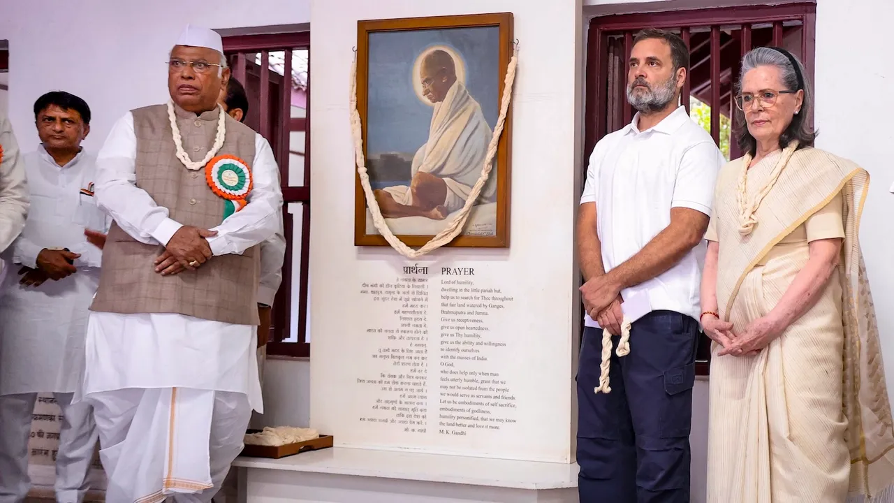 Mallikarjun Kharge, Rahul Gandhi and Sonia Gandhi during a prayer meet at the Sabarmati Ashram in Ahmedabad on Tuesday, April 8, 2025.
