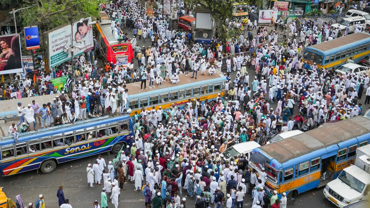 Vehicles stuck in a traffic jam as members of the Muslim community gather to protest against the Waqf (Amendment) Bill 2025, in Kolkata, Thursday, April 10, 2025.