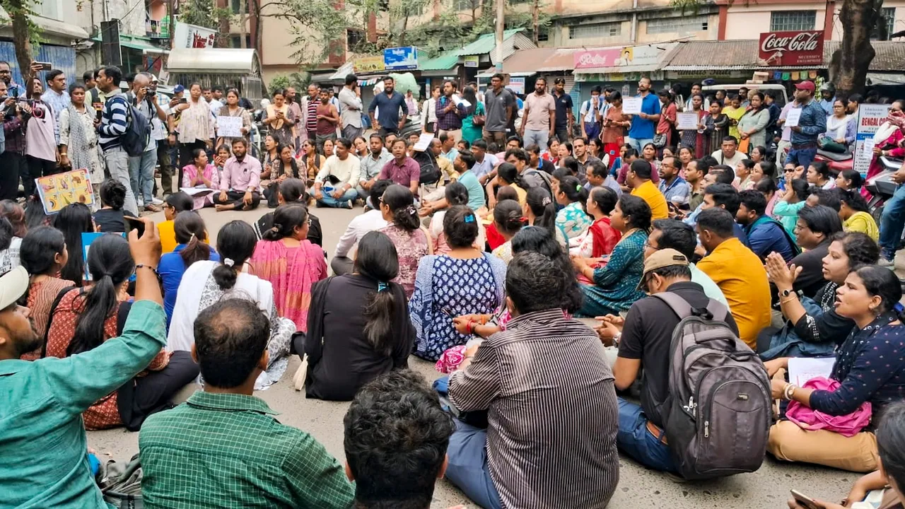 School teachers protest at the office of the District Inspector of Schools over loss of school job issue in Siliguri on Wednesday, April 9, 2025.