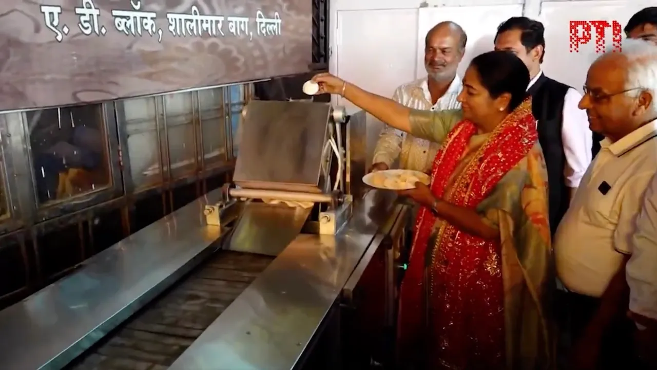 Delhi CM Rekha Gupta inaugurates a roti-making machine at a temple in AD Block in Shalimar Bagh on the occasion of Hanuman Jayanti on Saturday, April 12, 2025.