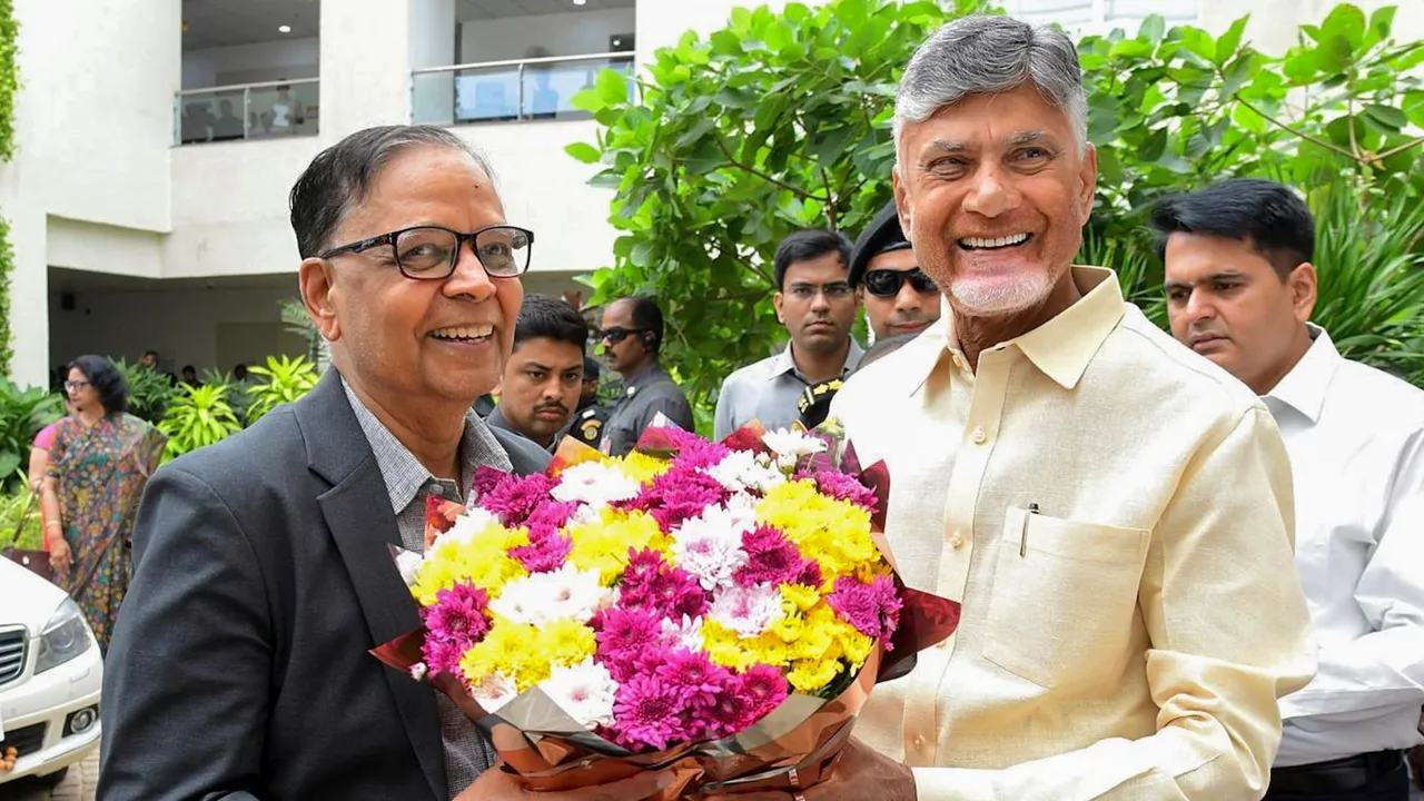 Andhra Pradesh Chief Minister N Chandrababu Naidu receives the Chairman of the 16th Finance Commission, Arvind Panagari, on his arrival in the state.