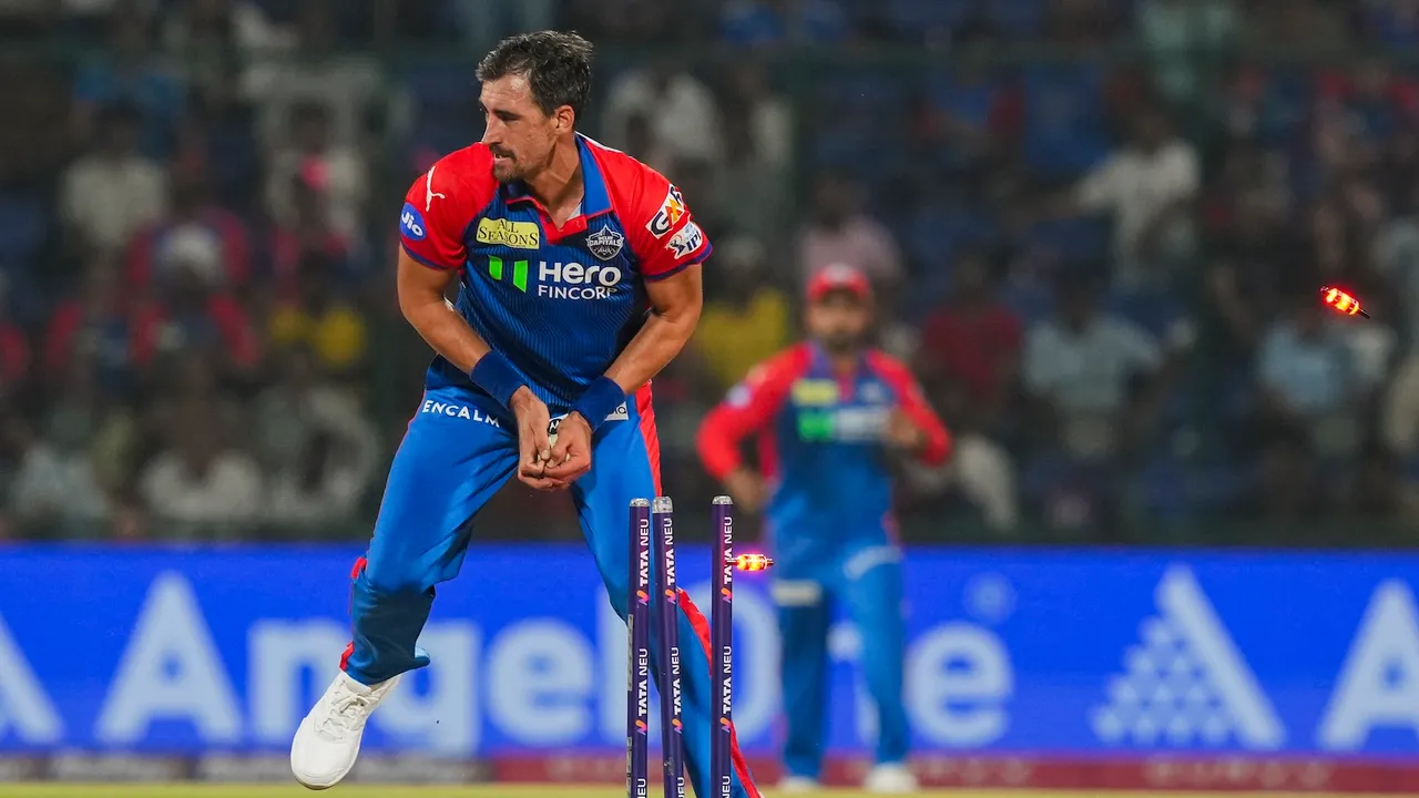 DC's Mitchell Starc runs out RR batter Riyan Parag at Arun Jaitley Stadium in New Delhi on Wednesday, April 16, 2025.