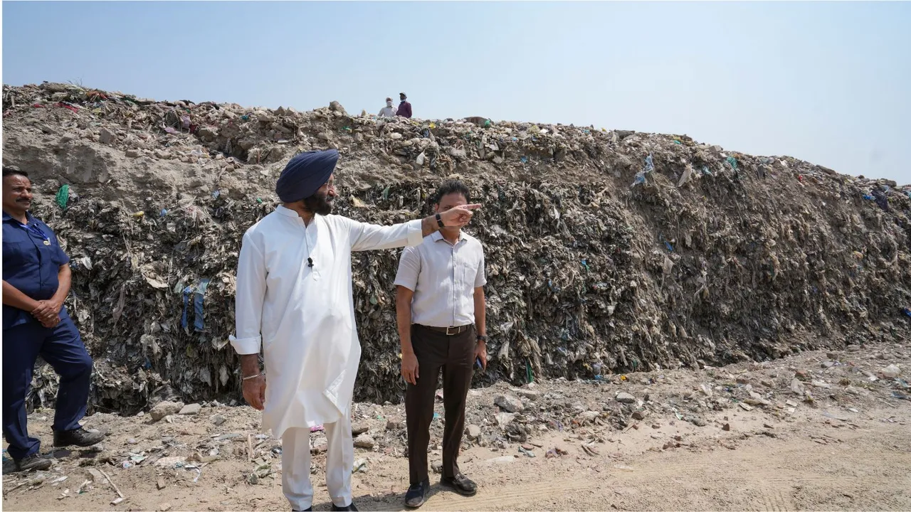 Delhi Forest and Environment Minister Manjinder Singh Sirsa during a visit to the Ghazipur landfill site for inspection of the ongoing remediation work among other things, in New Delhi.