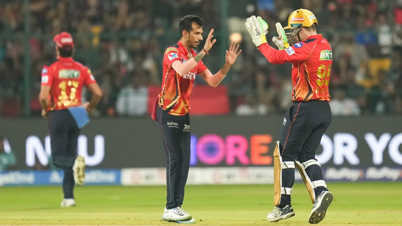 PKBS' Y Chahal celebrates the wicket of RCB's Rajat Patidar at M Chinnaswamy Stadium in Bengaluru on Friday, April 18, 2025.