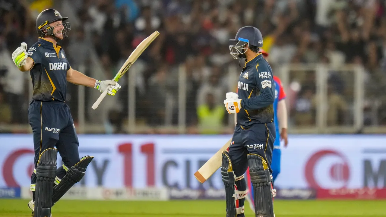 Gujarat Titans' Jos Buttler and Rahul Tewatia celebrate their win against Delhi Capitals at Narendra Modi Stadium in Ahmedabad on Saturday, April 19, 2025.