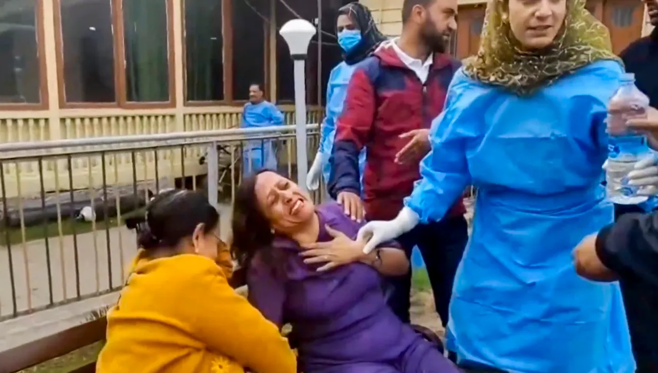 People react after terrorists attacked a group of tourists at Pahalgam in Anantnag district of Jammu & Kashmir on Tuesday, April 22, 2025.