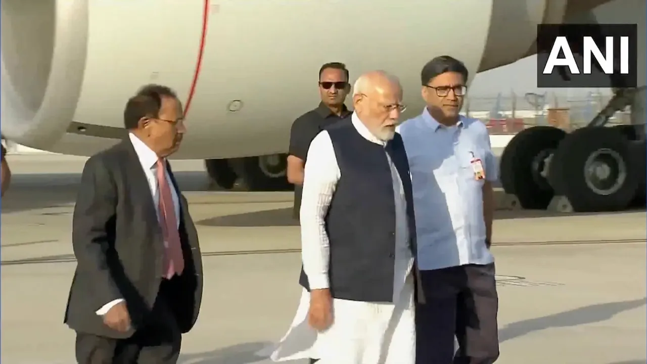 Ajit Doval (left) and Narendra Modi at Delhi Airport on Wednesday, April 23, 2025.