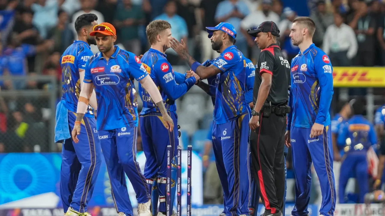 Mumbai Indians' players celebrate after beating Lucknow Super Giants at the Wankhede Stadium in Mumbai on Sunday, April 27, 2025.