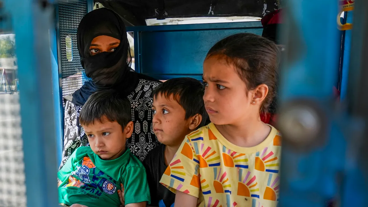 Indian passport holder Ramsha, with her children having Pakistan nationality, arrives at Attari-Wagah border checkpost near Amritsar on Monday, April 28, 2025.