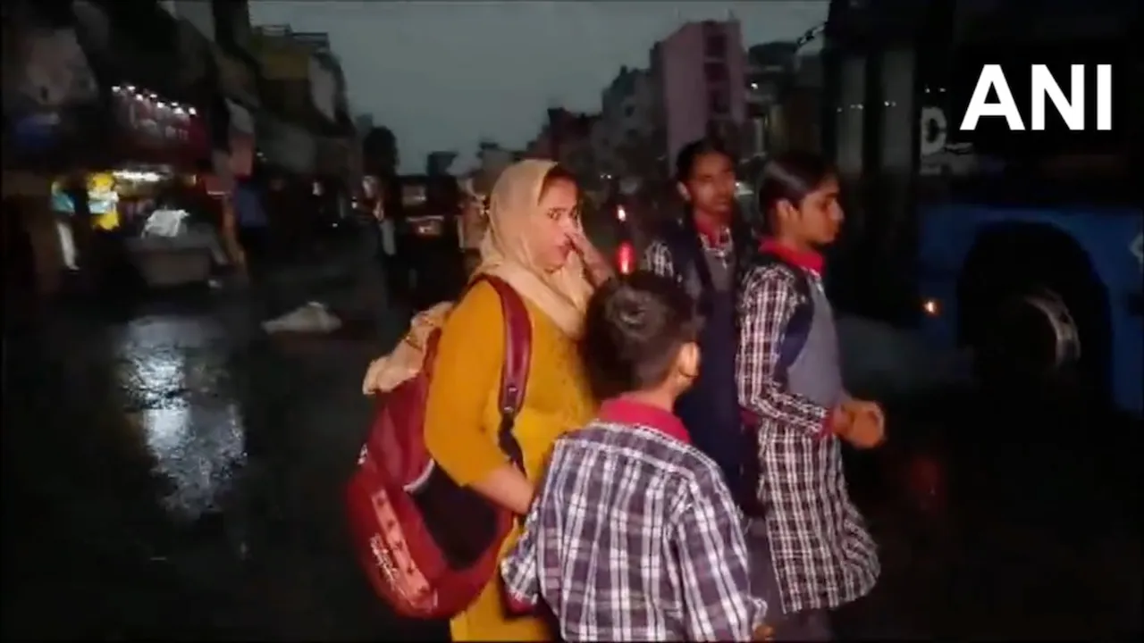 School children after early morning heavy rainfall, strong winds and lightning.