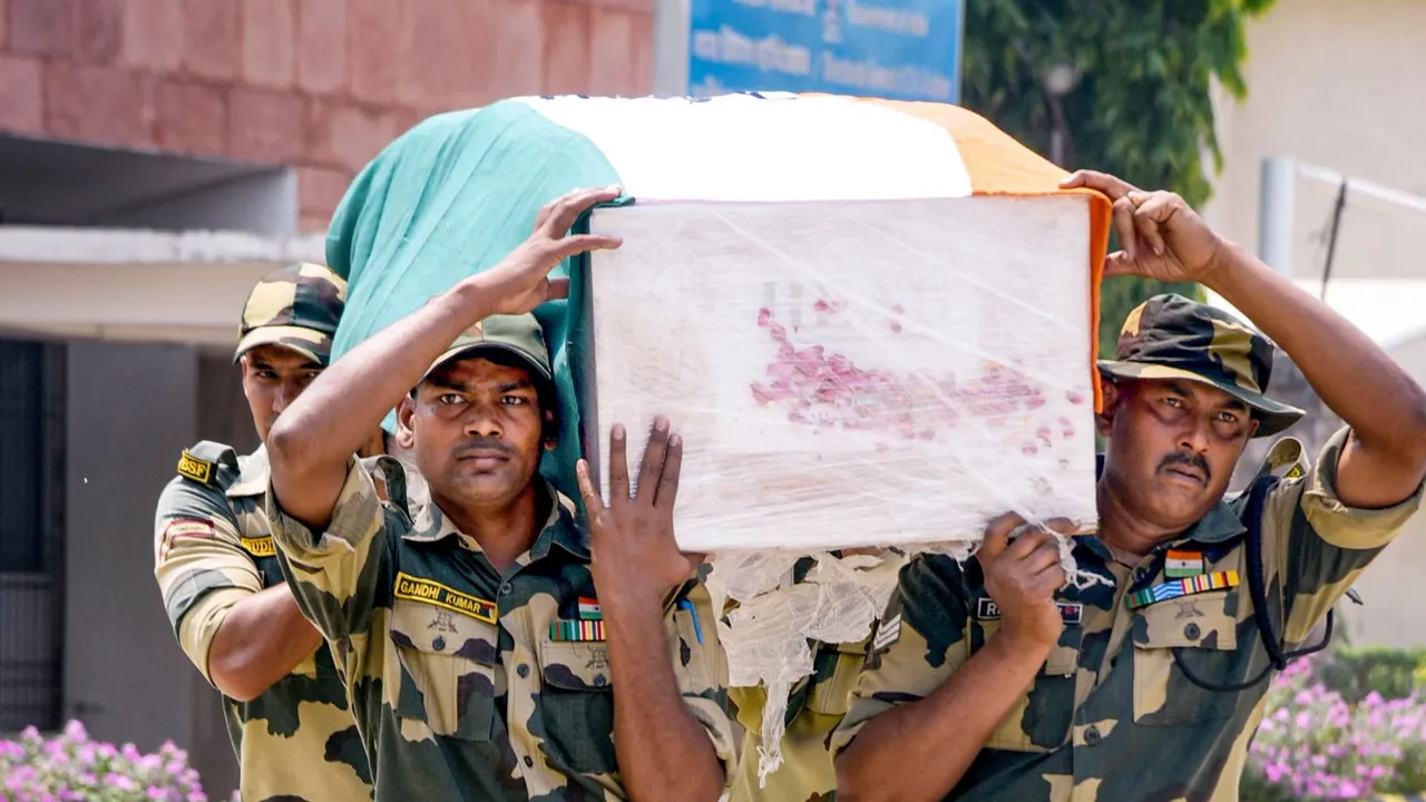 BSF personnel carry the mortal remains of BSF Sub-Inspector Mohammad Imtiaz, who lost his life in the line of duty in Jammu district, in Patna