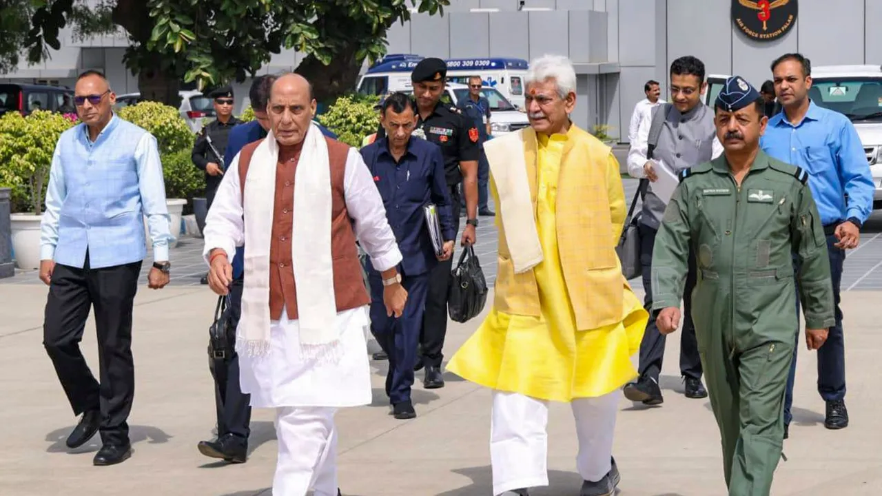 Defence Minister Rajnath Singh with J&K LG Manoj Sinha departs for Srinagar, in New Delhi.