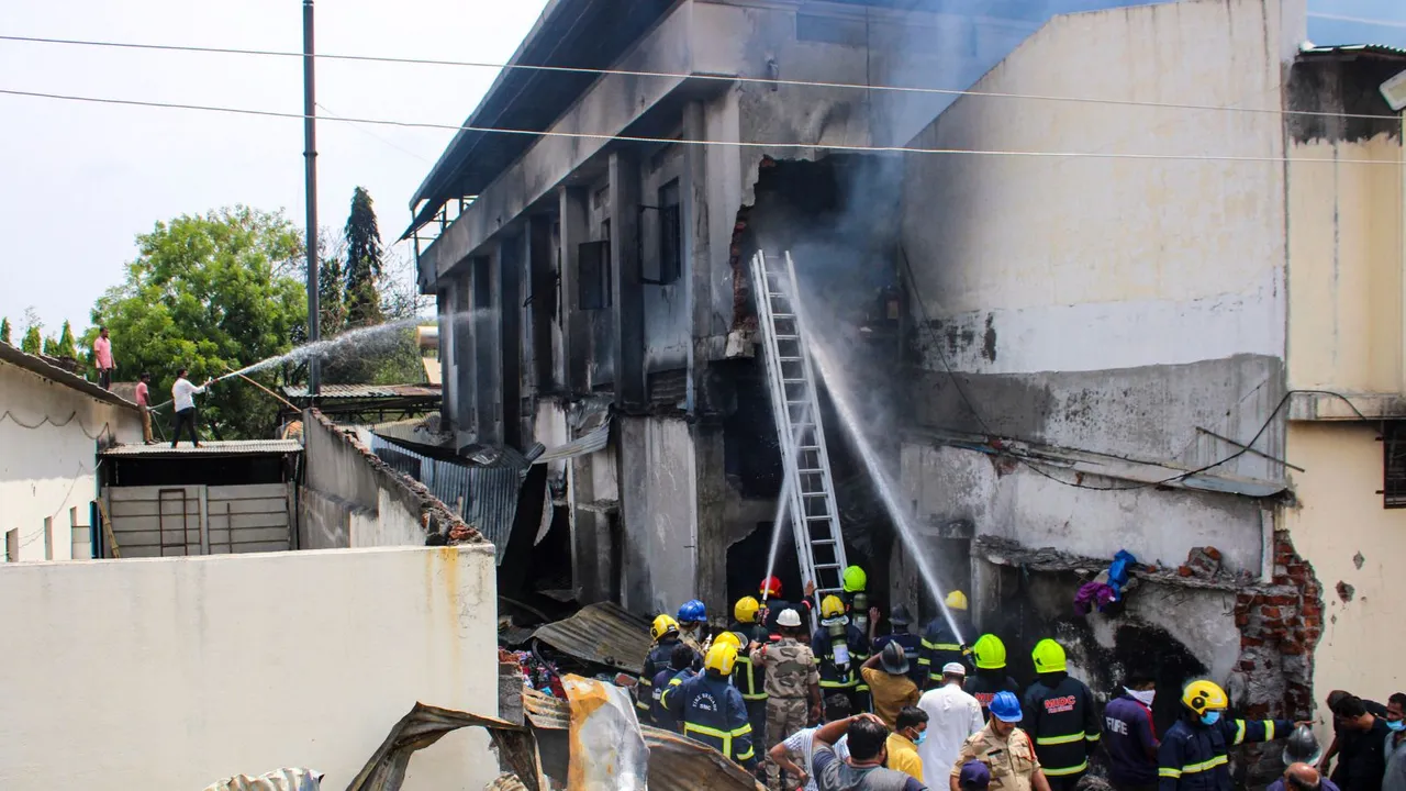 Firefighters try to douse a fire that broke out at a factory, at MIDC area in Solapur, Maharashtra
