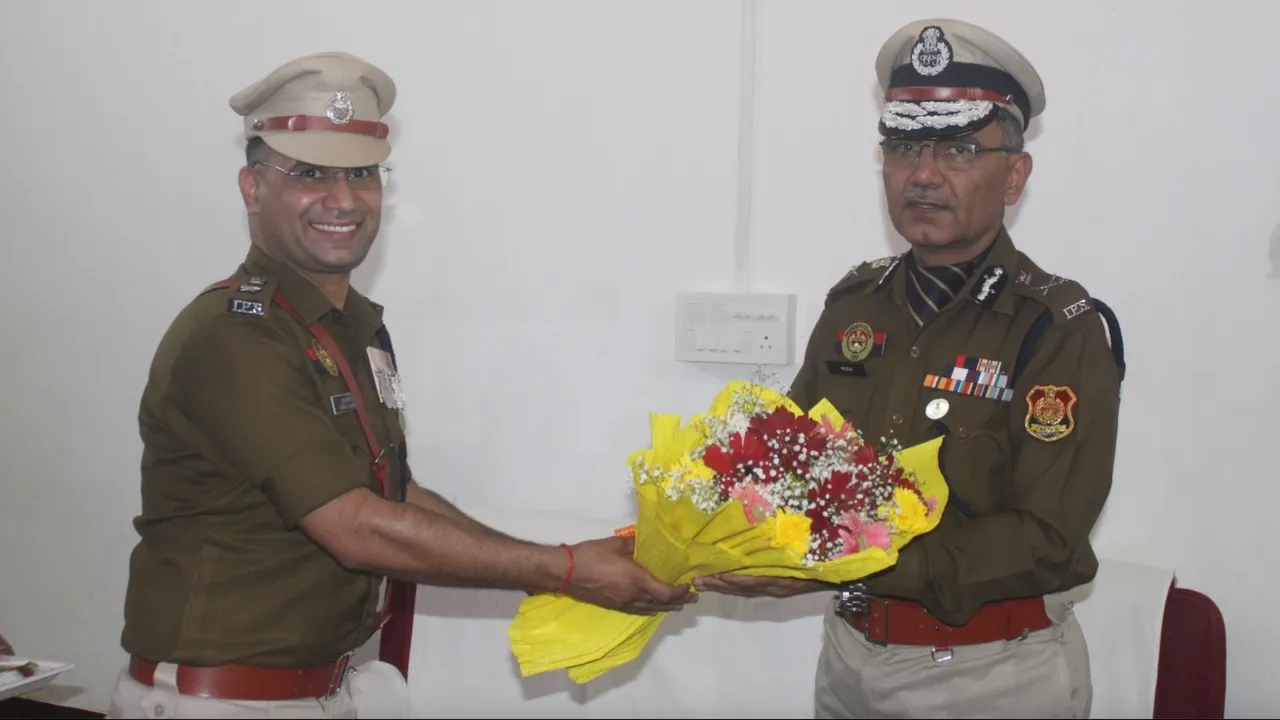 Senior IPS officer Anurag (right)