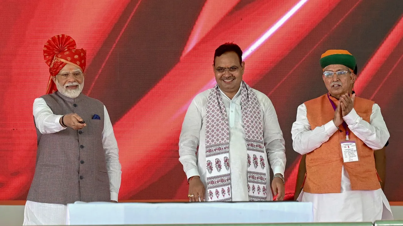 Prime Minister Narendra Modi with MoS Arjun Ram Meghwal and Rajasthan Chief Minister Bhajanlal Sharma during the inauguration and foundation stone laying of various development projects, in Bikaner district, Rajasthan.