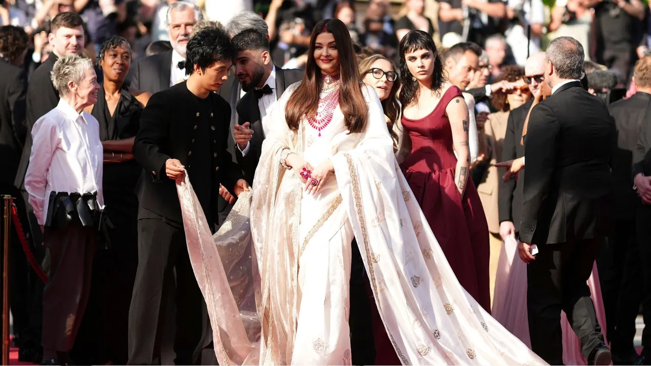 Aishwarya Rai Bachchan poses for photographers upon arrival at the premiere of the film 'The History of Sound' at the 78th international film festival, Cannes, southern France.