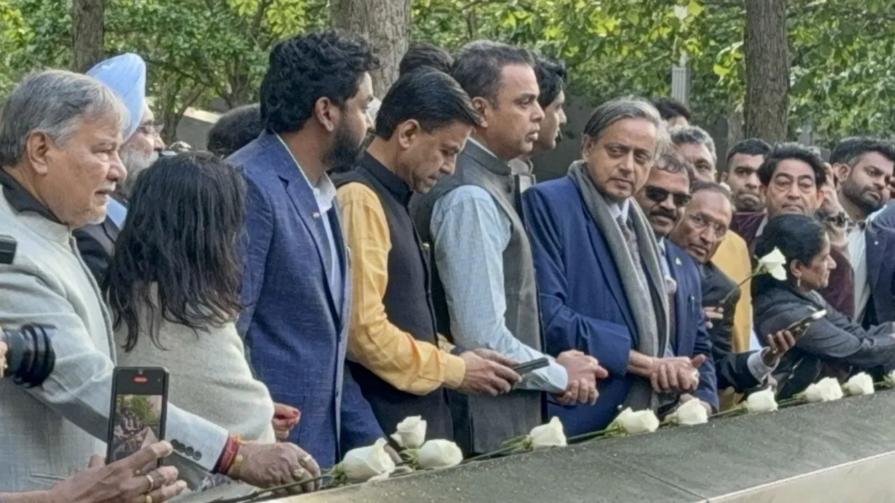 Congress MP Shashi Tharoor with Shiv Sena MP Milind Deora and others pays tribute at the National September 11 Memorial, during their visit as part of a multi-party delegation, in New York.