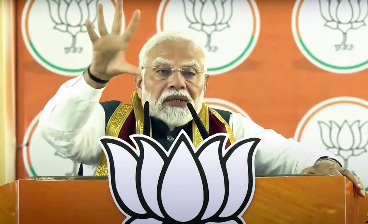 Prime Minister Narendra Modi addresses a public meeting, in Alipurduar, West Bengal.