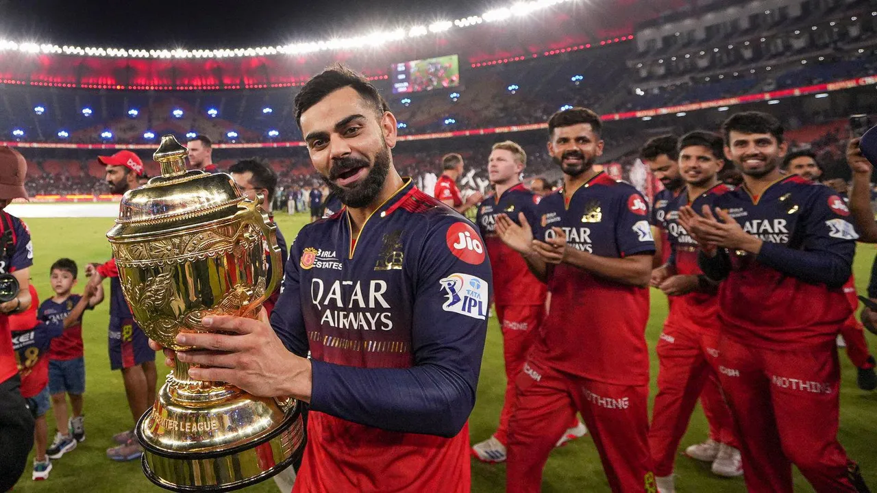 Virat Kohli lifts IPL trophy after 18 years