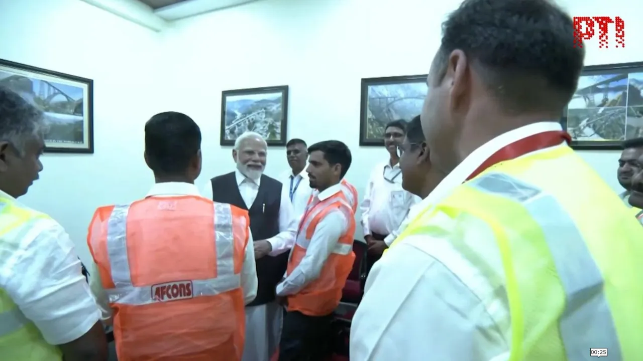 PM Modi visits Chenab bridge; interacts with engineers, workers.