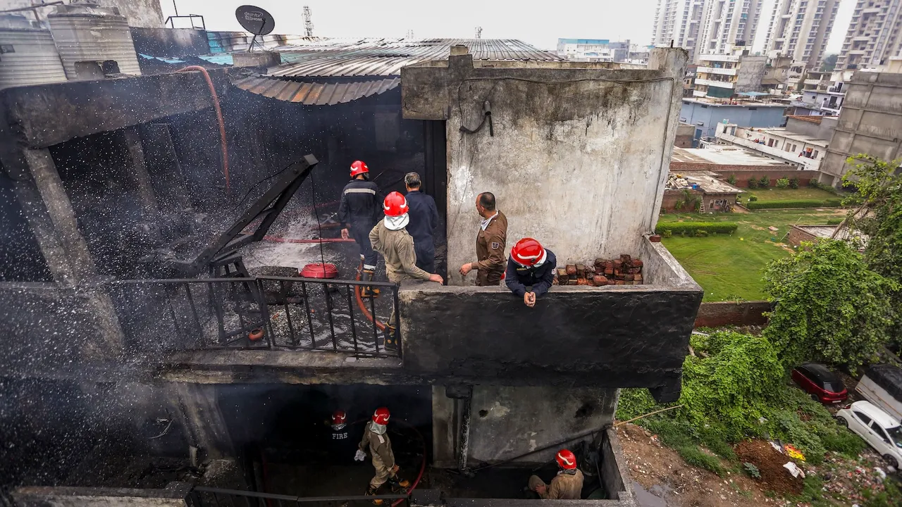Firefighters try to douse a fire that broke out in a chemical factory, at Rithala, in New Delhi, Wednesday, June 25, 2025. At least four people were killed in the incident.