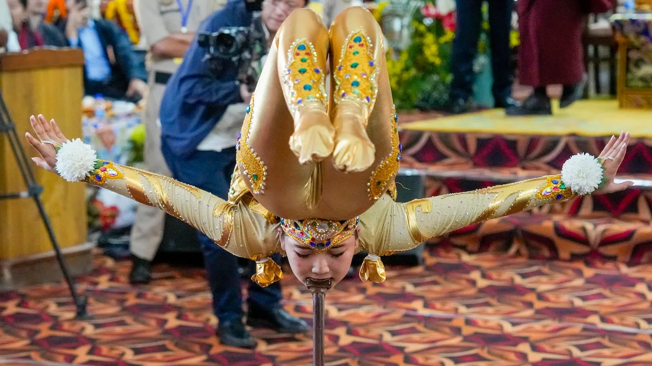 A member of Tebetan cultural groups performs during the celebration of Dalai Lama's 90th birthday, at Tsuglagkhang, the main Dalai Lama temple, McLeodganj, in Kangra district, Himachal Pradesh, Sunday, July 6, 2025.