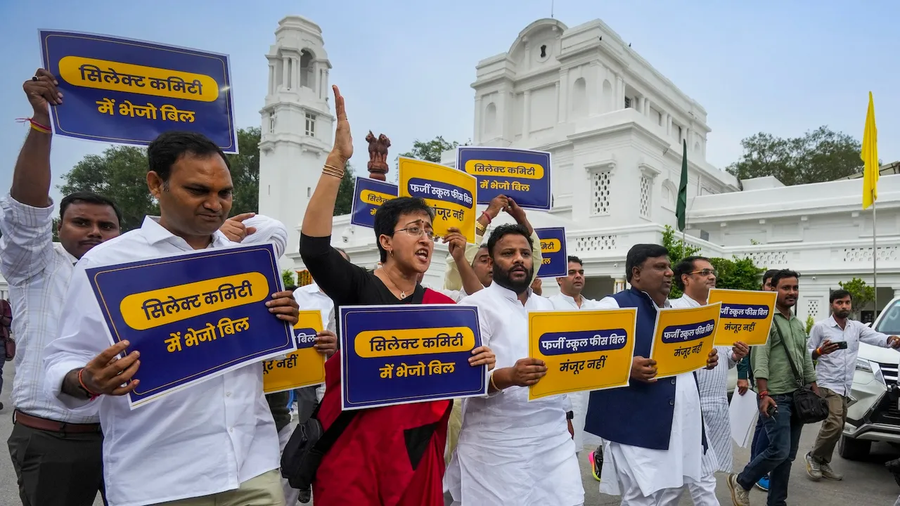 Atishi with party leaders stages a protest demanding that the BJP-led government's bill regarding school fees should be sent to a Select Committee, during the first day of the state Assembly's Monsoon session, in New Delhi, Monday, Aug. 4, 2025.