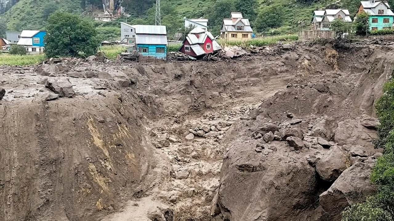 Houses are damaged after a cloudburst, in Kishtwar district, Jammu and Kashmir, Thursday, Aug. 14, 2025.