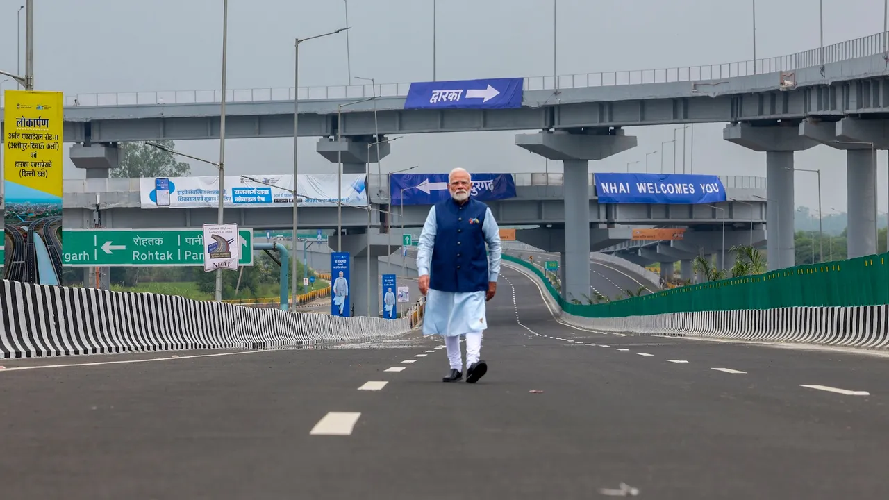 Narendra Modi with Union Minister Nitin Gadkari, Delhi Chief Minister Rekha Gupta and Haryana Chief Minister Nayab Saini during the inauguration of the Delhi section of the Dwarka Expressway and the Urban Extension Road-II (UER-II), in New Delhi, Sunday, Aug. 17, 2025.