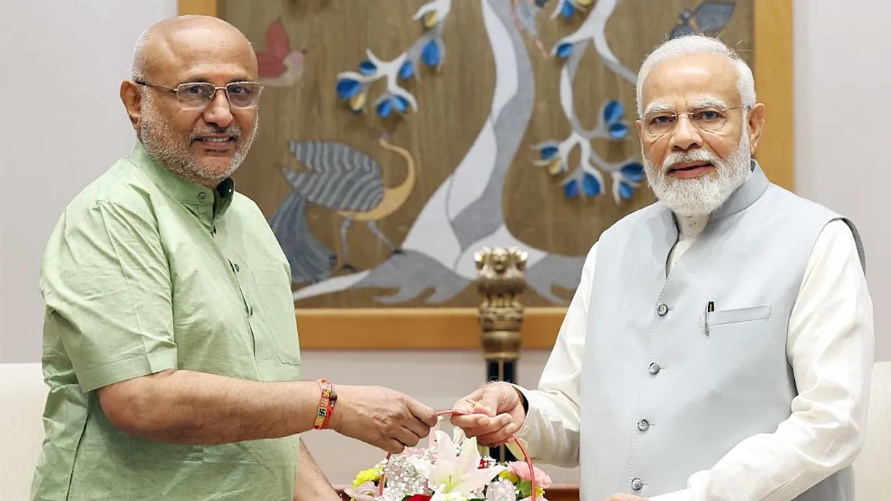 C P Radhakrishnan and Narendra Modi (File photo)
