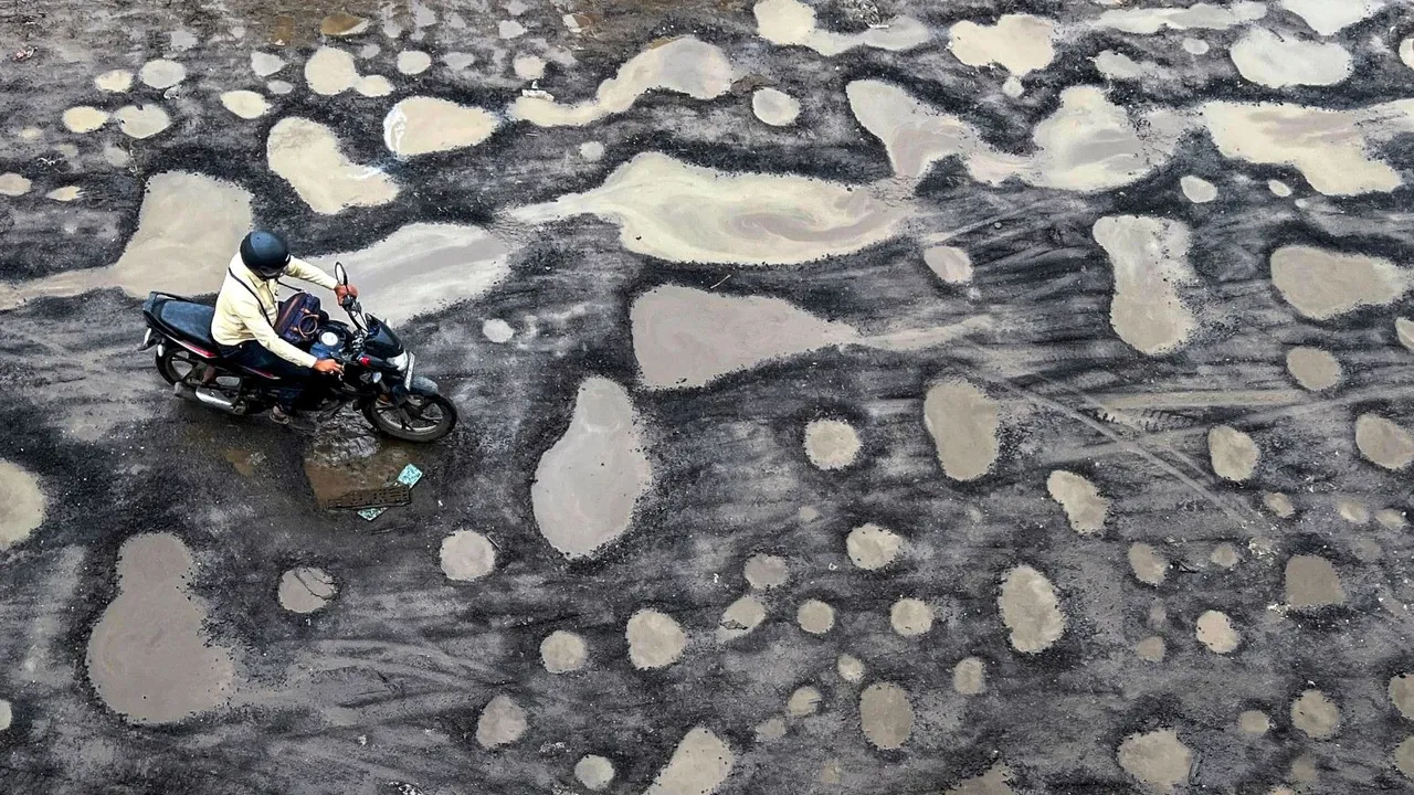 Potholes image Monsoon BMC MCD Mumbai Roads Highways Mumbai Rains Delhi Rains Waterlogging