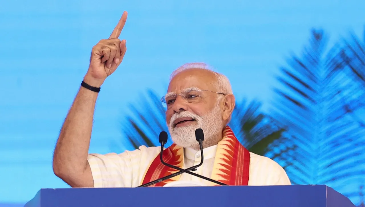 Narendra Modi addresses the gathering during the inauguration and foundation stone laying ceremony of development projects, at Khodaldham ground, in Ahmedabad on August 25, 2025.