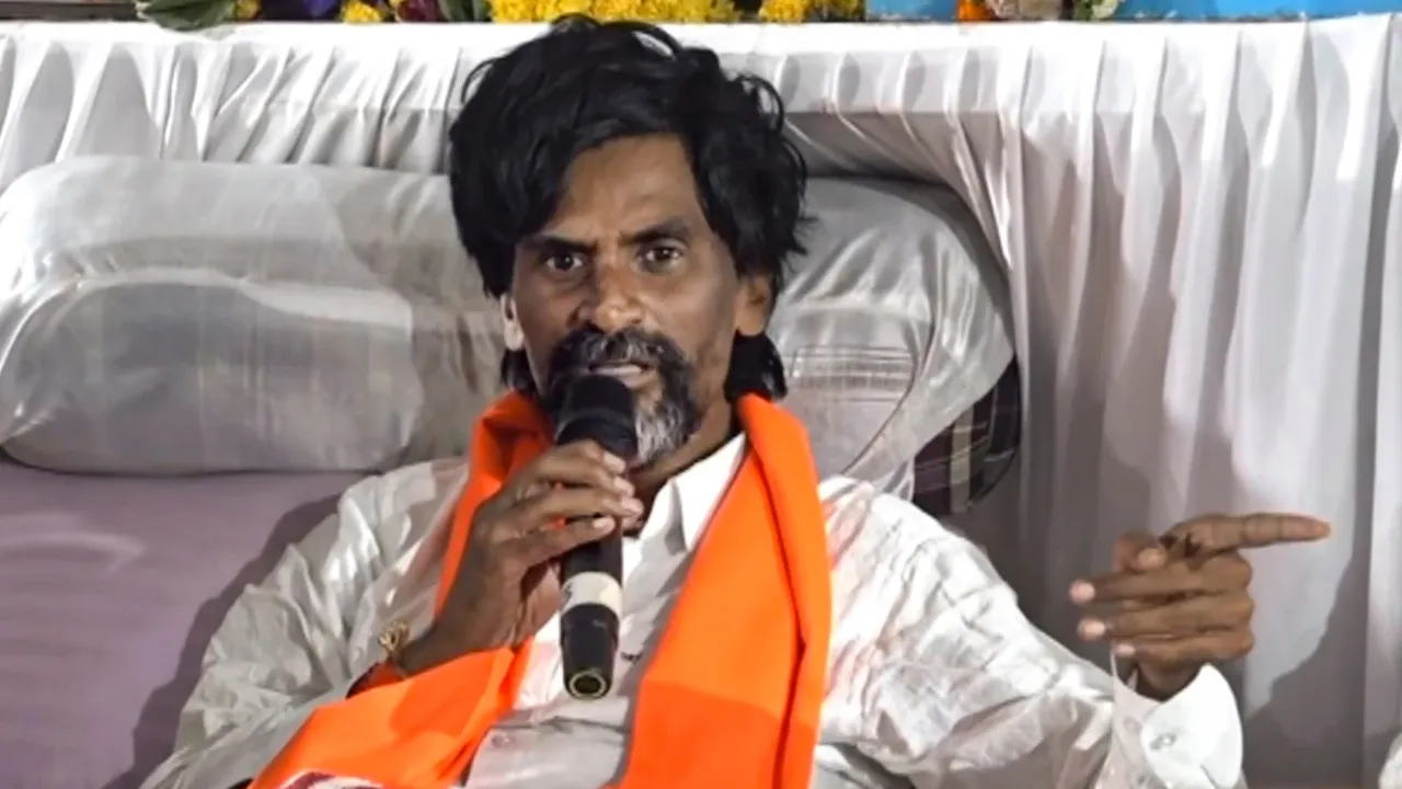 Manoj Jarange Patil addresses a gathering during his hunger strike over the Maratha quota demand, at Azad Maidan, in Mumbai, Monday, Sept. 1, 2025