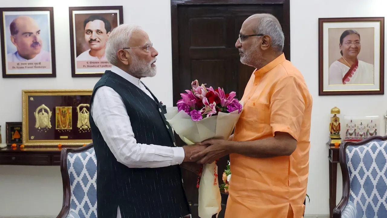 Narendra Modi congratulates Vice President-elect C P Radhakrishnan after the latter was elected the 15th Vice President of India, during a meeting at Union Minister Pralhad Joshi's residence in New Delhi on Sept 9, 2025.