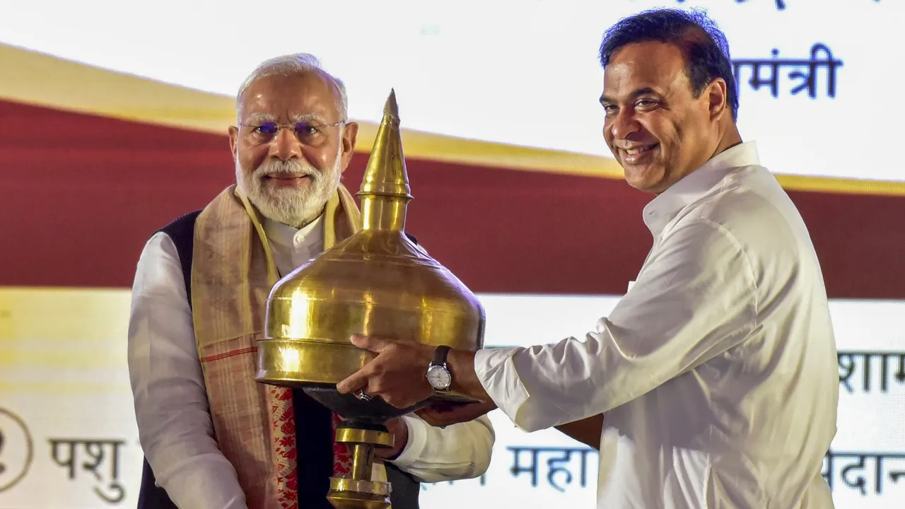 Prime Minister Narendra Modi being felicitated by Assam Chief Minister Himanta Biswa Sarma during a programme organised on the occasion of the birth centenary celebration of legendary singer and Bharat Ratna awardee Bhupen Hazarika, in Guwahati, Assam, Saturday, Sept. 13, 2025.