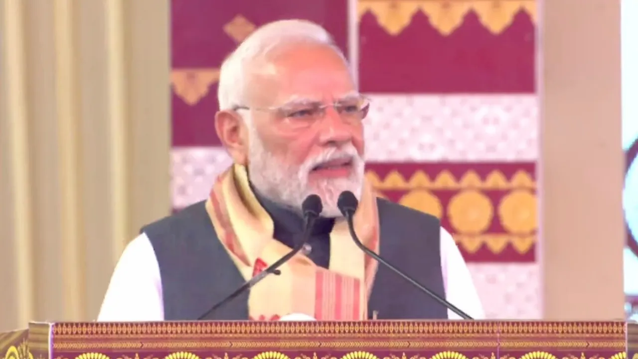 Narendra Modi speaking at a programme in Darrang, Assam on Sunday, Sept 14, 2025.