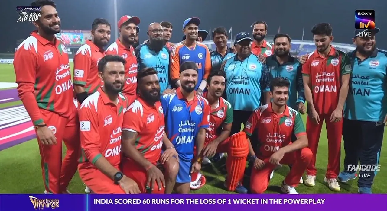 Suryakumar Yadav poses for a picture with Oman team