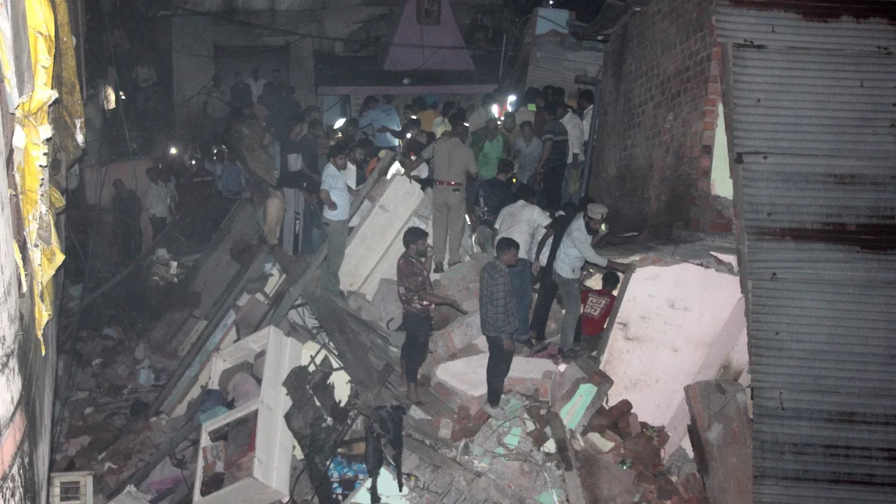 Rescue work underway after a three-storey house collapsed following rains, at Ranipura in Indore, Monday night, Sept. 22, 2025.