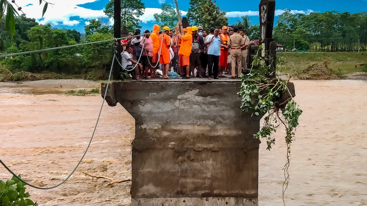 Rescue operation underway after landslides hit the area following heavy rainfall, in Darjeeling, Sunday, Oct. 5, 2025.