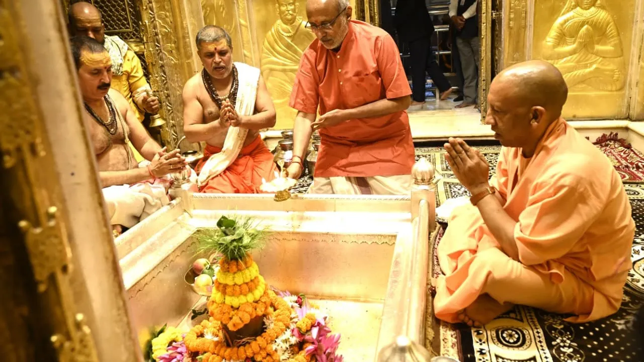 Vice President C.P. Radhakrishnan and Uttar Pradesh Chief Minister Yogi Adityanath offer prayers at the Kashi Vishwanath Temple, in Varanasi, on Friday, Oct 31, 2025.
