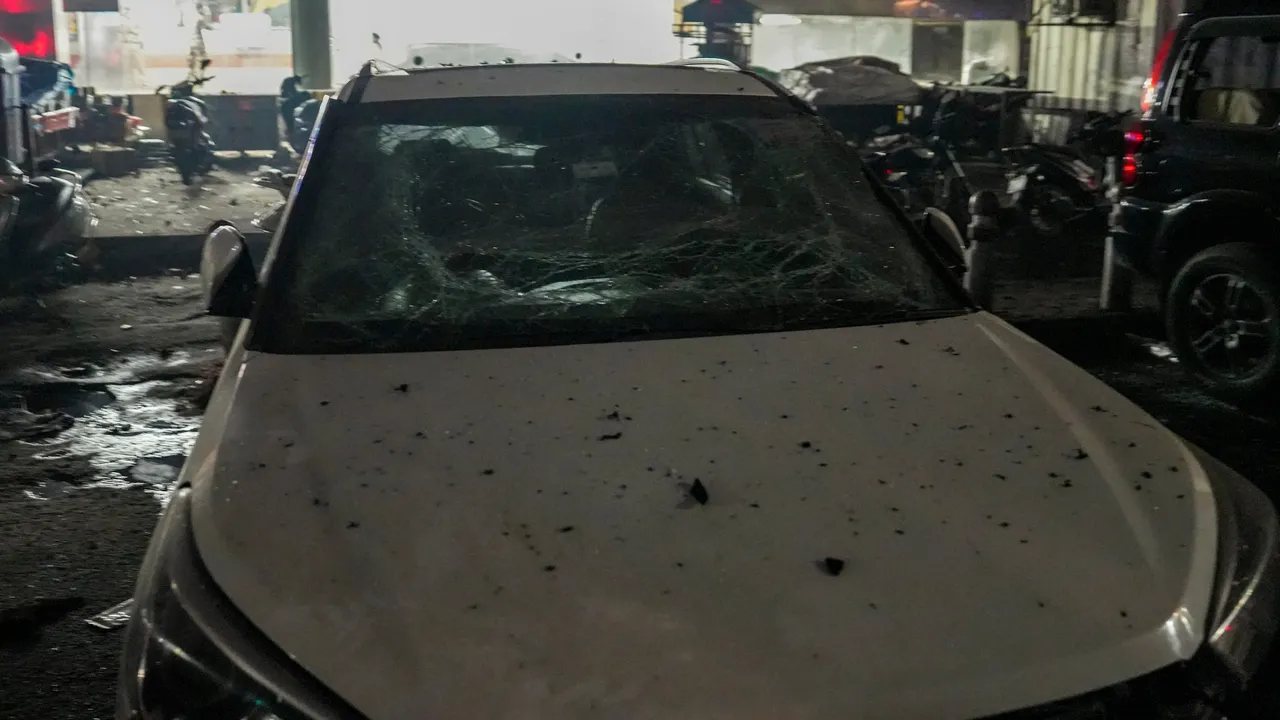 A damaged vehicle at the spot after a blast occurred in a parked car near Red Fort, leaving multiple vehicles in flames, in New Delhi, Monday, Nov. 10, 2025. At least one person was killed in the incident.
