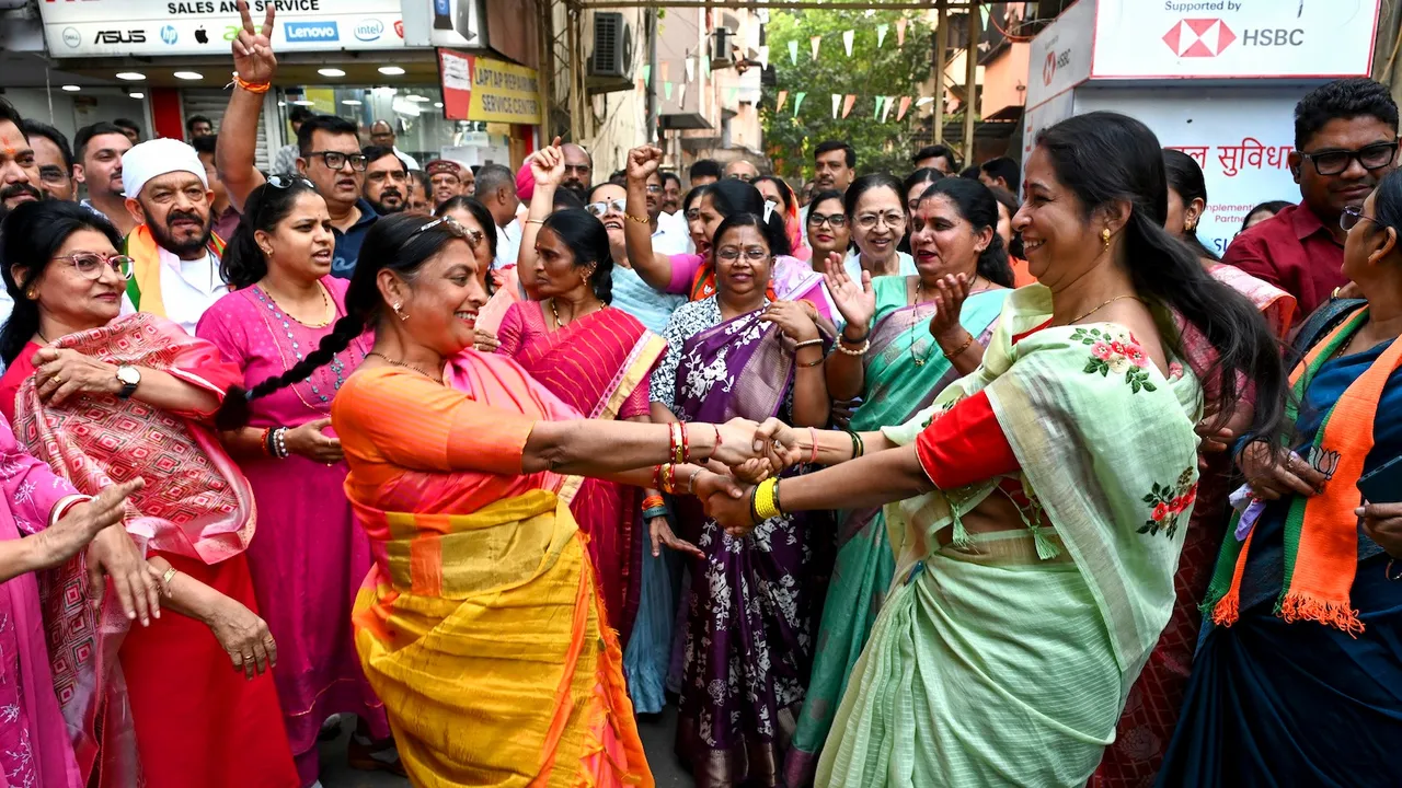 BJP workers celebrate the NDA's victory in the Bihar Assembly elections, at the party office, in Nagpur, Maharashtra, Friday, Nov. 14, 2025.