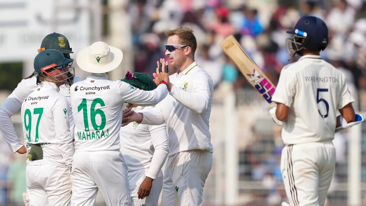 Simon Harmer with teammates after the wicket of Ravindra Jadeja during the third day of the first Test cricket match of a series between India and South Africa, at Eden Gardens in Kolkata, Sunday, Nov. 16, 2025.
