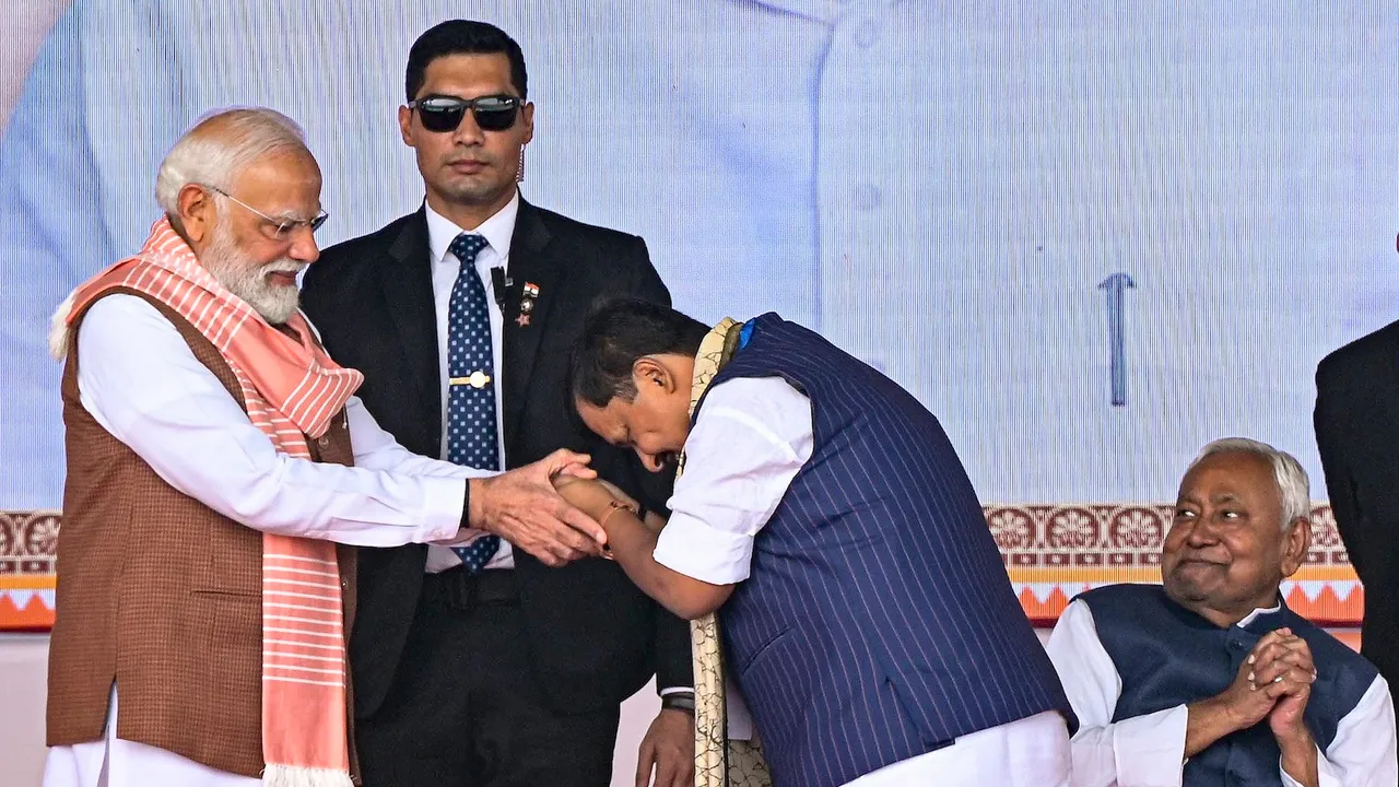 In this Thursday, Nov. 20, 2025 file photo, Prime Minister Narendra Modi being greeted by BJP MLA Nitin Nabin during the swearing-in ceremony of the new state cabinet, in Patna.