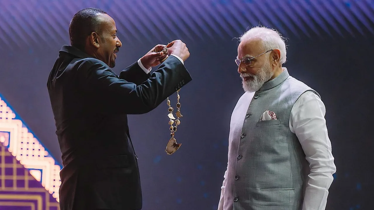Narendra Modi being conferred with Ethiopia's highest award 'The Great Honour Nishan of Ethiopia' by his Ethiopian counterpart Abiy Ahmed Ali during a ceremony at the Addis International Convention Centre, in Addis Ababa, on Wednesday, December 16, 2025.