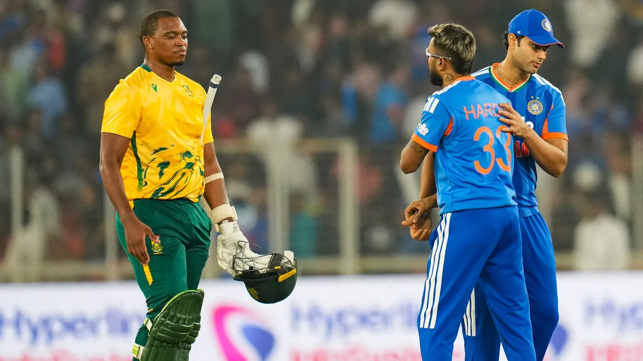 Shivam Dube and Hardik Pandya exchange greetings after the team's victory in the fifth T20 International cricket match against South Africa, at Narendra Modi Stadium in Ahmedabad, Friday, Dec. 19, 2025.