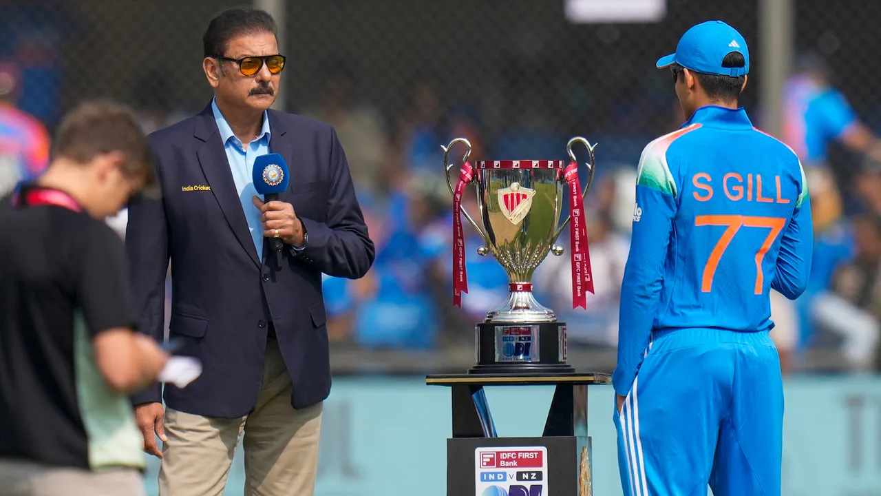 Shubman Gill and Michael Bracewell with Ravi Shastri during the toss before the start of the third ODI cricket match between India and New Zealand, at Holkar Cricket Stadium, in Indore, Madhya Pradesh, Sunday, Jan. 18, 2026.