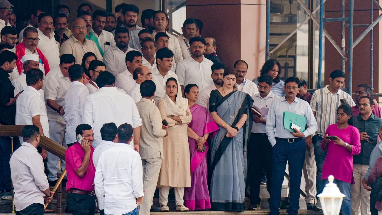 NCP leaders wait for late Maharashtra deputy chief minister and party chief Ajit Pawar's wife Sunetra Pawar before the party's legislature meeting, outside Vidhan Bhavan in Mumbai, Saturday, Jan. 31, 2026.